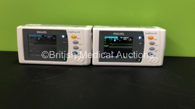 2 x Philips IntelliVue X2 Patient Monitors with Press, Temp, NBP, SPO2 and ECG Resp Options and 2 x Batteries *Mfds - 2008 and 2009* (Both Power Up)