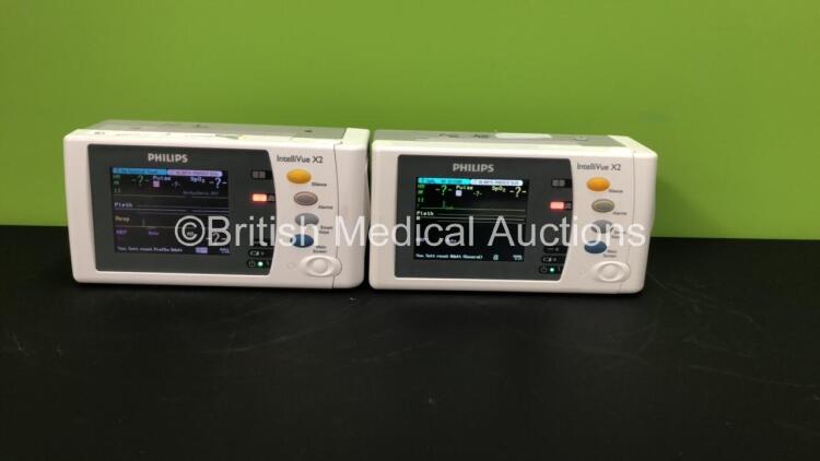 2 x Philips IntelliVue X2 Patient Monitors with Press, Temp, NBP, SPO2 and ECG Resp Options and 2 x Batteries *Mfds - 2009* (Both Power Up)