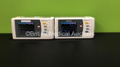 2 x Philips IntelliVue X2 Patient Monitors with Press, Temp, NBP, SPO2 and ECG Resp Options and 2 x Batteries *Mfds - 2009 and 2015* (Both Power Up, 1 Damaged Casing - See Photo)