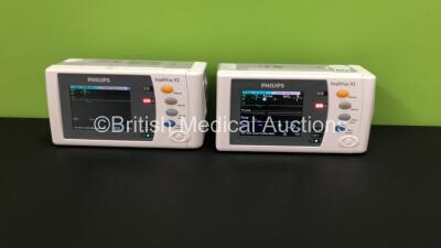 2 x Philips IntelliVue X2 Patient Monitors with Press, Temp, NBP, SPO2 and ECG Resp Options and 2 x Batteries *Mfds - 2009* (Both Power Up)