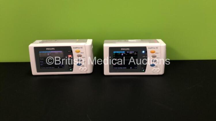 2 x Philips IntelliVue X2 Patient Monitors with Press, Temp, NBP, SPO2 and ECG Resp Options and 2 x Batteries *Mfds - 2009 and 2014* (Both Power Up)