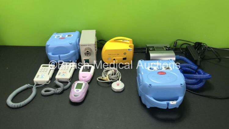 Mixed Lot Including 1 x Olympus MU-1 Light Source (Untested Due to Faulty Power Switch-See Photo) 2 x Media Actineb Nebulizers (1 Powers Up. 1 No Power Due to Cut Cable-See Photo) 1 x Huntleigh Dopplex Fetal Doppler (Powers Up with Missing Probe Tip-See P