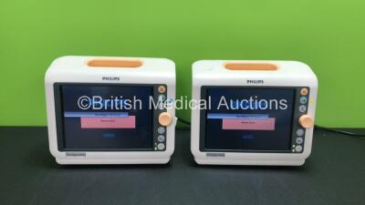 2 x Philips Sure Signs VM4 Patient Monitors Including ECG, SpO2, NBP and Printer Options (Both Power Up) *SN US90327768 - US90327771*