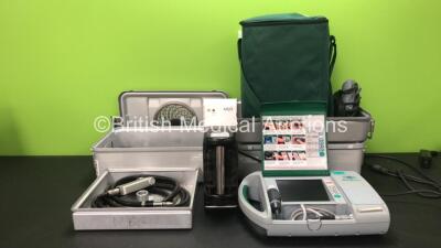 Mixed Lot Including 3 x Surgical Instrument Trays *1 with Missing Lid* 1 x MicroAire4740 Pulse Lavage Handpiece with Hose, 1 x Arjo Type NDAA2000-GB Battery Charger (Powers Up) 1 x Bard Scan PA-00145 Bladder Scanner with 1 x Battery (Untested Due to Possi