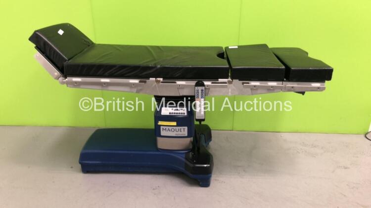 Maquet Alphastar Electric Operating Table Model No 1132.11A0 with Cushions and Controller (Powers Up)