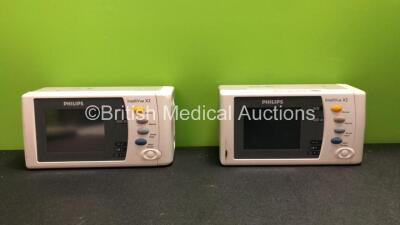 2 x Philips IntelliVue X2 Handheld Patient Monitors Software Versions H.03.14 Including ECG, SpO2, NBP, Temp and Press Options with 2 x Batteries (1 Powers Up, 1 No Power when Tested with Stock Batteries- Batteries Included Flat, Both With Cracked Casing 