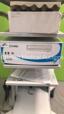Conmed Stack System with ConMed HD 1080p LED Monitor, ConMed IM8000 TrueHD 3mos Camera Control Unit, ConMed True HD 3mso Camera Head Ref IM8120, ConMed LS8000 Direct LED Light Source, ConMed DRSHD 1080p Data Management System and Monitor (Powers Up) - 6