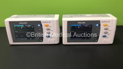 2 x Philips IntelliVue X2 Handheld Patient Monitors S/W Rev H.15.53 / H.15.45 with Press/Temp, NBP, SpO2 and ECG/Resp Options with 2 x Batteries - Flat (Both Power Up with Stock Batteries) *Mfd 2018 / 2011*
