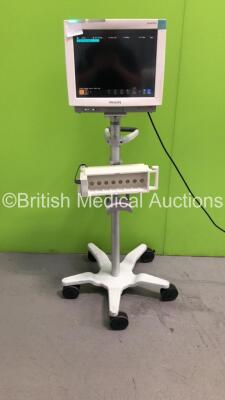 Philips IntelliVue MP70 Patient Monitor on Stand with Agilent M3000A Module with Press, Temp, NBP, SPO2 and ECG/Resp Options on Stand (Powers Up)