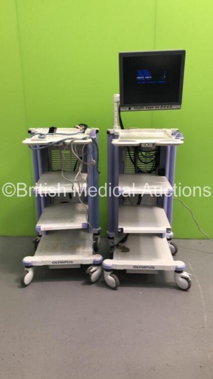 2 x Olympus Stack Trolleys with Olympus OEV191H (Powers Up) *S/N 7612203*