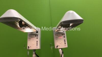 Fisher and Paykel Servo Mobile Infant Warmers on Stands (Both Power Up) *S/N 061213001499 / 070209000181* - 2