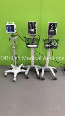 2 x Mindray Datascope Accutorr Plus Vital Signs Monitors on Stands with BP Hoses and 1 x CSI Criticare Comfort Cuff 506N3 Series Vital Signs Monitor on Stand with SPO2 Finger Sensor (All Power Up) *S/N 312720222 / A7508522L0 / A7508549L0*