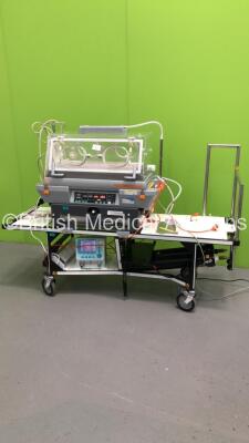 Atom V-808 Atom Transcapsule Incubator (Powers Up) on Ferno Transport Trolley with Acutronic Fabian Ventilator (Powers Up with Error) *S/N 58825 / 020906*