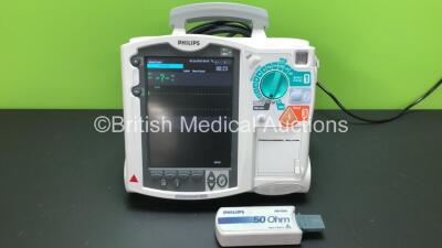 2 x Philips Heartstart MRx Defibrillators Including Pacer, ECG and Printer Option with 2 x Philips M3539A Batteries, 2 x Philips M3538 Module and 2 x Paddle Leads with Test Loads *Mfd 2013-2012* (Both Power Up) *SN US00