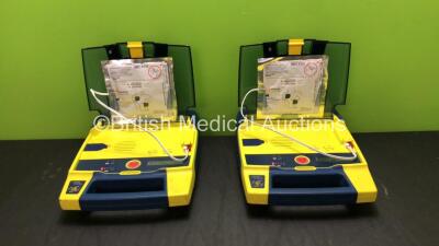 2 x Cardiac Science Powerheart AED G3 Defibrillators with 2 x Batteries (Both Power Up)