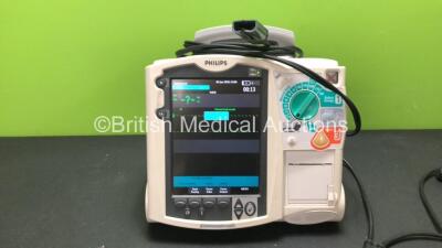 Philips MRx Defibrillator Including ECG and Printer Options with 1 x Philips M3538A Battery, 1 x Philips M3539A Module and 1 x Paddle Lead (Powers Up) *SN US00329923*