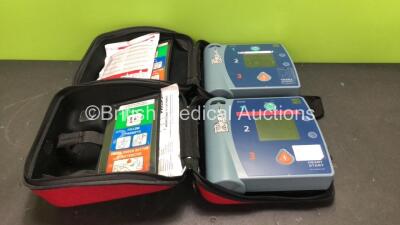 2 x Philips Heartstart FR2+ Defibrillators with 2 x Philips M3863A Batteries *Install Dates 07-2023, 08-2021* (Both Power Up and Pass Self Tests) *SN 0911891297, 1011890167*