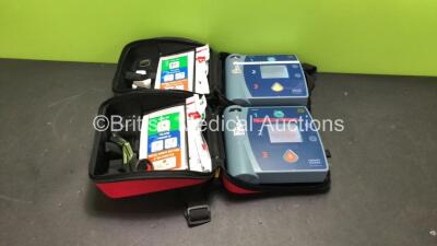 2 x Philips Heartstart FR2+ Defibrillators with 2 x Philips M3863A Batteries *Install Dates 09-2022, 07-2023* (Both Power Up and Pass Self Tests) *SN 0911891265, 0911891238*