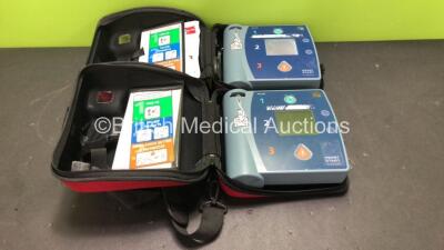 2 x Philips Heartstart FR2+ Defibrillators with 2 x Philips M3863A Batteries *Install Dates 09-2022, 02-2019* (Both Power Up and Pass Self Tests) *SN 1011890092, 0911891292*