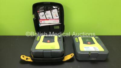 2 x Zoll AED PRO Defibrillators with 1 x Carry Cases (Both Power Up with Damage when Tested with Stock Battery-Batteries Not Included)