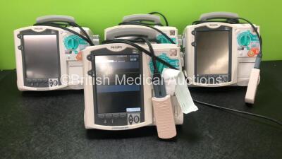 4 x Philips Heartstart MRx Defibrillators Including Pacer, ECG and Printer Options, 4 x Philips M3538A Batteries, 4 x Philips M3539A Modules, 4 x Paddle Leads and 4 x Philips M3725A 50 Ohm Test Loads (All Power Up)