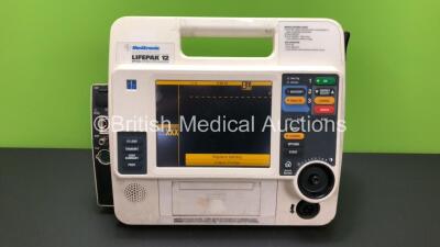 Medtronic Lifepak 12 Biphasic Defibrillator / Monitor Including ECG and SpO2 Options *Mfd 2003* (Powers Up with Stock Battery, Battery Not Included)