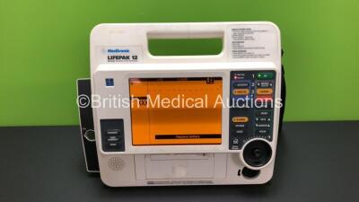 Medtronic Lifepak 12 Biphasic Defibrillator / Monitor Including ECG Option *Mfd 2006* (Powers Up with Stock Battery, Battery Not Included)