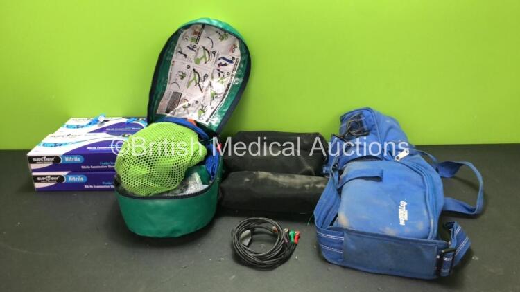 Mixed Lot Including Including 400 x Nitrile Examination Gloves, 1 x ACR Ambulance Child Restraint, 3 x Kendrick Traction Splints and 1 x OxyLitre Bottle Bag