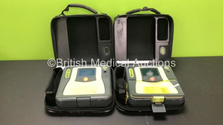 2 x Zoll AED Pro Defibrillators in Carry Cases (Both Power Up when Tested with Stock Battery-Batteries Not Included)