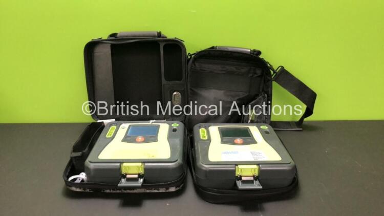 2 x Zoll AED Pro Defibrillators in Carry Cases (Both Power Up when Tested with Stock Battery-Batteries Not Included)