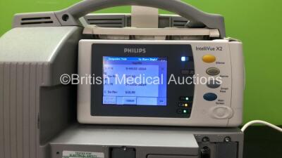 Philips IntelliVue MP30 Touch Screen Patient Monitor Software Version G.01.80 (Powers Up) *Mfd 03-2006* with 1 x Philips IntelliVue X2 Handheld Patient Monitor Software Version G.01.80 Including ECG, SpO2, NBP, Temp and Press Options *Mfd 01-2013* (Powers - 4