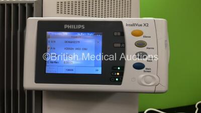 Philips IntelliVue MP70 Anesthesia Touch Screen Patient Monitor Software Version H.15.45*Mfd 08-2009* (Powers Up) 1 x Philips IntelliVue X2 Handheld Patient Monitor Software Version H.15.51 Including ECG, SpO2, NBP, Temp and Press Options *Mfd 10-2014* (P - 5