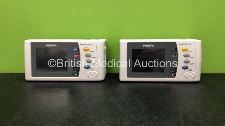 2 x Philips IntelliVue X2 Handheld Patient Monitors Software Versions G.01.80, G.01.75 Including ECG, SpO2, NBP, Temp and Press Options (Both Power Up) *Mfd 08-2009, 06-2010* *SN DE95048805, DE83629849* *C*