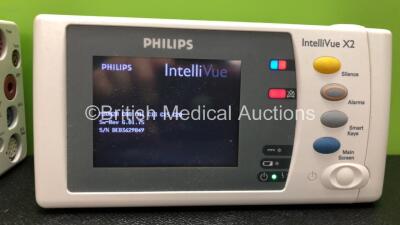 2 x Philips IntelliVue X2 Handheld Patient Monitors Software Versions G.01.80, G.01.75 Including ECG, SpO2, NBP, Temp and Press Options (Both Power Up) *Mfd 08-2009, 06-2010* *SN DE95048805, DE83629849* *C* - 4