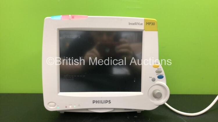 Philips IntelliVue Ref 862135 MP30 Touch Screen Patient Monitor Software Version G.01.80 with 1 x Philips IntelliVue X2 Handheld Patient Monitor Software Version G.01.75 Including ECG, SpO2, NBP, Press and Temp Options *Mfd 08-2009* (Powers Up) *SN DE8362