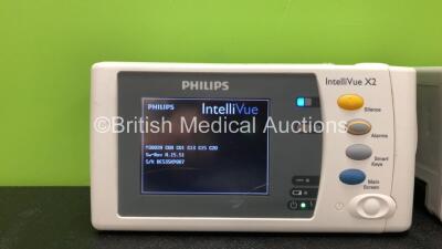 2 x Philips IntelliVue X2 Handheld Patient Monitors Software Versions H.15.51, G.01.75 Including ECG, SpO2, NBP, Temp and Press Options (Both Power Up) *Mfd 08-2009, 10-2015* *SN DE535K9007,DE83629794* *C* - 2