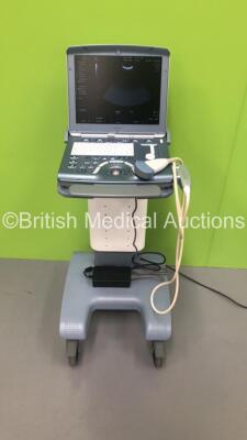 GE Voluson i Portable Ultrasound Scanner *S/N B02250* **Mfd 05/2009** Software Version 8.2.2.947 with 1 x Transducer / Probe (AB2-7-RS Ref H44901AD *Mfd 04/2013*) on GE Voluson Dock Cart (Powers Up - Damage to Machine - See Pictures) (W) ***IR034***