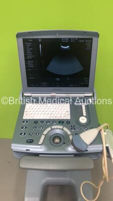 GE Voluson i Portable Ultrasound Scanner *S/N B02250* **Mfd 05/2009** Software Version 8.2.2.947 with 1 x Transducer / Probe (AB2-7-RS Ref H44901AD *Mfd 04/2013*) on GE Voluson Dock Cart (Powers Up - Damage to Machine - See Pictures) (W) ***IR034*** - 2