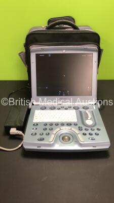 GE Voluson-i Portable Ultrasound Scanner *Mfd - 10/2015* with Power Supply in Case (Powers Up, Damaged Casing - See Photos) *B05529*