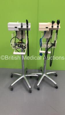 2 x Welch Allyn Otoscope / Ophthalmoscope Sets on Stands with 4 x Handpieces and 3 x Heads (Both Power Up)