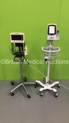 1 x Welch Allyn Spot Vital Signs Monitor on Stand (Powers Up) and 1 x Welch Allyn 52000 Series Vital Signs Monitor on Stand (Powers Up and then Powers Down)