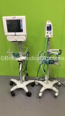 1 x Fukuda Denshi PeliTelemo Patient Monitor on Stand with 1 x BP Hose and 1 x SpO2 Finger Sensor and 1 x Spacelabs Healthcare Ultraview SL Patient Monitor on Stand (Both Power Up- 1 x Damaged Casing-See Photos)