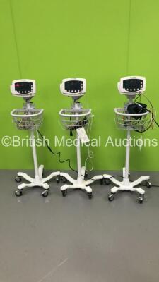 3 x Welch Allyn 53N00 Patient Monitors on Stands with 2 x SpO2 Finger Sensors and 3 x BP Hoses (All Power Up)