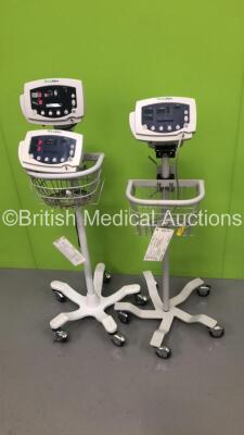 3 x Welch Allyn 53N00 Patient Monitors on 2 x Stands with 2 x BP Hoses (2 x Power Up,1 x No Power)