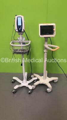 1 x Welch Allyn SPOT Vital Signs Monitor on Stand with BP Hose and SPO2 Finger Sensor and 1 x Philips SureSigns VM4 Patient Monitor on Stand with ECG, SPO2 and BP Options - Missing Side Cover (Both Power Up)