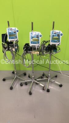 3 x Critikon Dinamap Compact TS Vital Signs Monitors on Stand with BP Hose and Cuffs (All Power Up - 2 x Lower Screens Faulty - See Pictures)