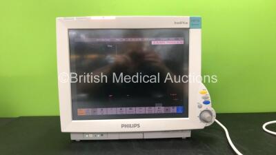 Philips IntelliVue MP70 Neonatal Ref M8007A Patient Monitor Software Revision G.01.80 with 1 x Philips M3001A Module Including ECG, SpO2, NBP, Temp and Press Options (Powers Up) *Mfd 07-2010* *SN DE907W3709, DE843A0443* *RI