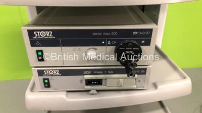 Karl Storz Stack System with Storz HD WideView Monitor, Storz 200903 31 Touch Screen Monitor, Storz 264305 20 SCB Electronic Endoflator, Storz 200961 20 AIDA Control Unit, Storz 2016340 20 Xenon Nova 300 Light Source, Storz 222010 20 SCB Image 1 Hub Camer - 6