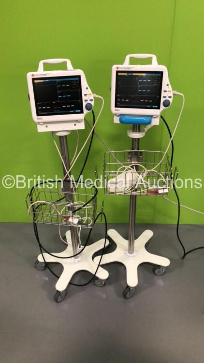 2 x InterMed Penlon PM-8000 Express Patient Monitors on Stands with SPO2 Finger Sensors (Both Power Up)