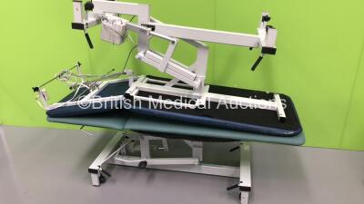 1 x Plinth 2000 Electric Patient Examination Couch and 1 x Plinth Co Hydraulic Patient Examination Couch (Hydraulics Tested Working,Unable to Test Due to No Footswitch)